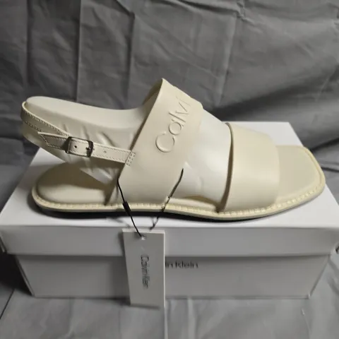 BOXED PAIR OF CALVIN KLEIN FLAT SANDALS - UK SIZE 38