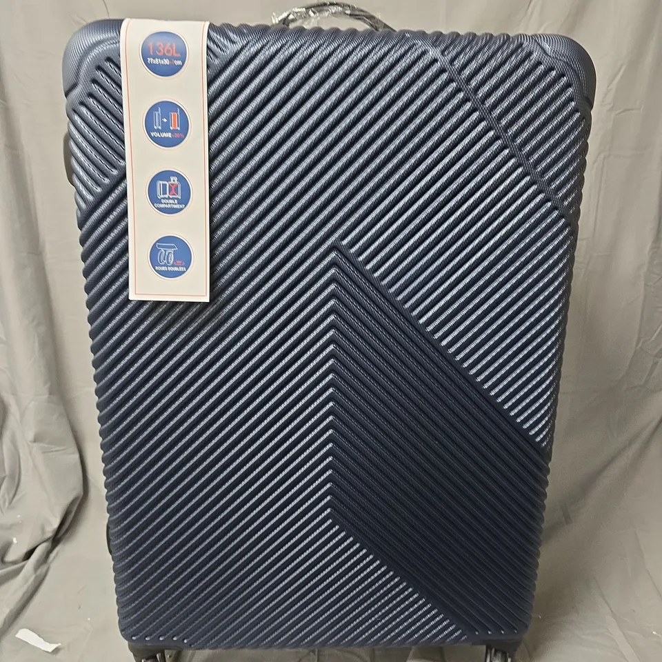 BLOOMLITE BLUE HARD-SHELL SUITCASE WITH 4 WHEELS - DIAGONAL RIBBED TEXTURE (136L)