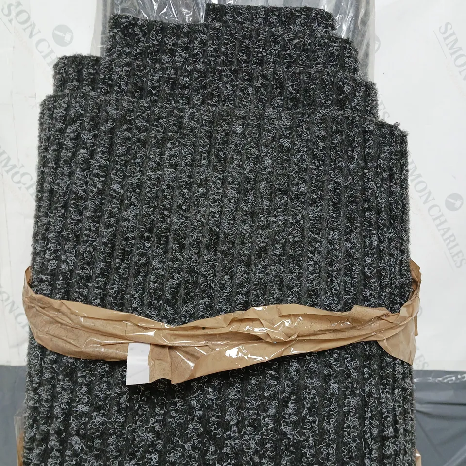 LARGE ROLL OUT RUG IN BLACK - SIZE UNSPECIFIED- COLLECTION ONLY