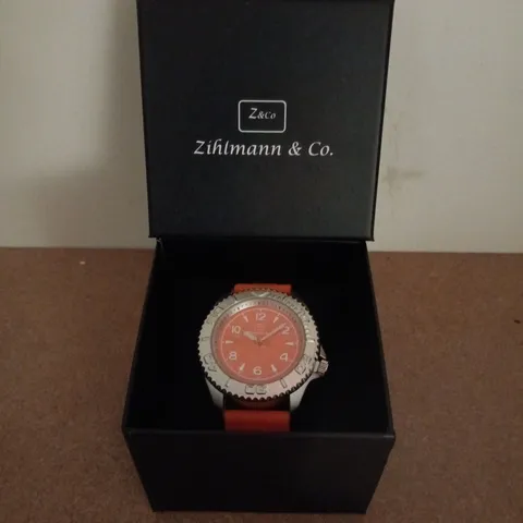 ZIHLMANN & CO STAINLESS STEEL WATCH WITH ORANGE DIAL & ORANGE RUBBER STRAP