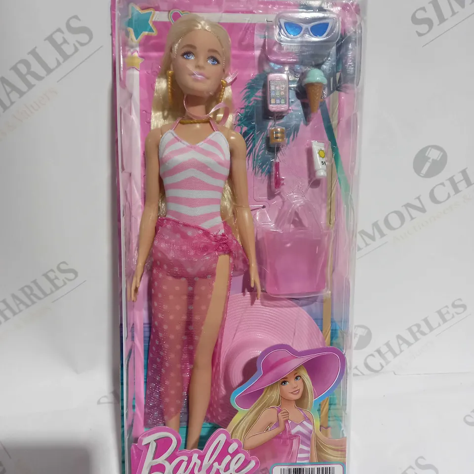 BLONDE BARBIE DOLL WITH SWIMSUIT AND BEACH-THEMED ACCESSORIES