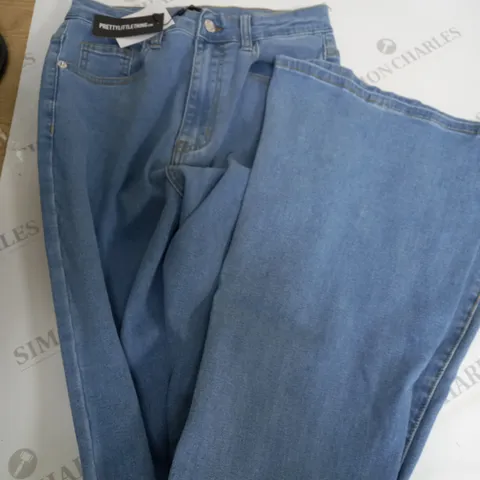 PRETTY LITTLE THING LIGHT DEMIN FLAIR JEANS - UK 10