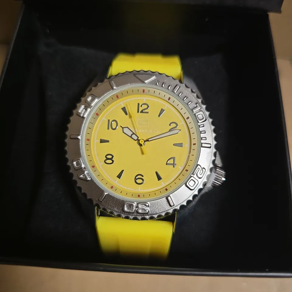 ZIHLMANN & CO STAINLESS STEEL WATCH WITH YELLOW FACE & RUBBER STRAP