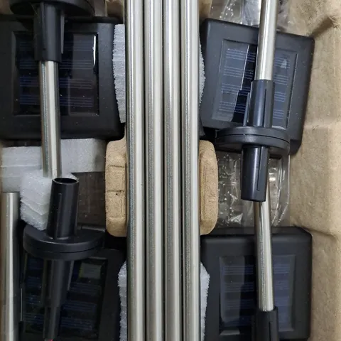 BOXED BELL & HOWELL GLIMMER STICKS SET OF 4 SOLAR PATHWAY LIGHTS