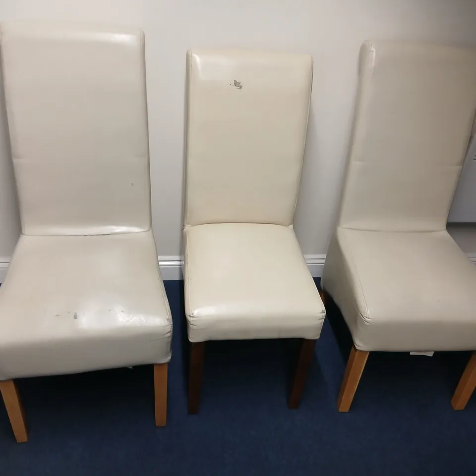 Set of 3 cream upholstered dining chairs with wooden legs