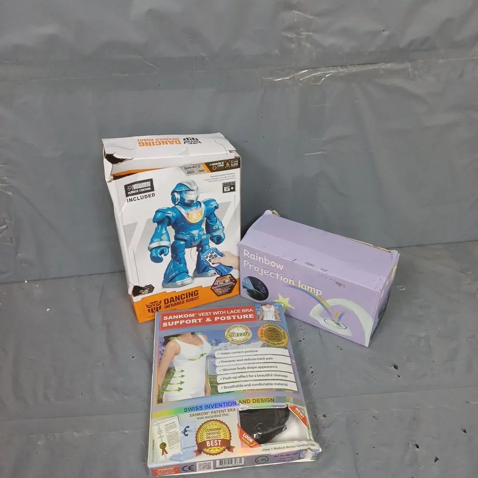 APPROXIMATELY 10 ASSORTED ITEMS TO INCLUDE DANCING ROBOT TOY, RAINBOW PROJECTION LAMP, SANKOM VEST WITH LACE BRA, ETC - COLLECTION ONLY