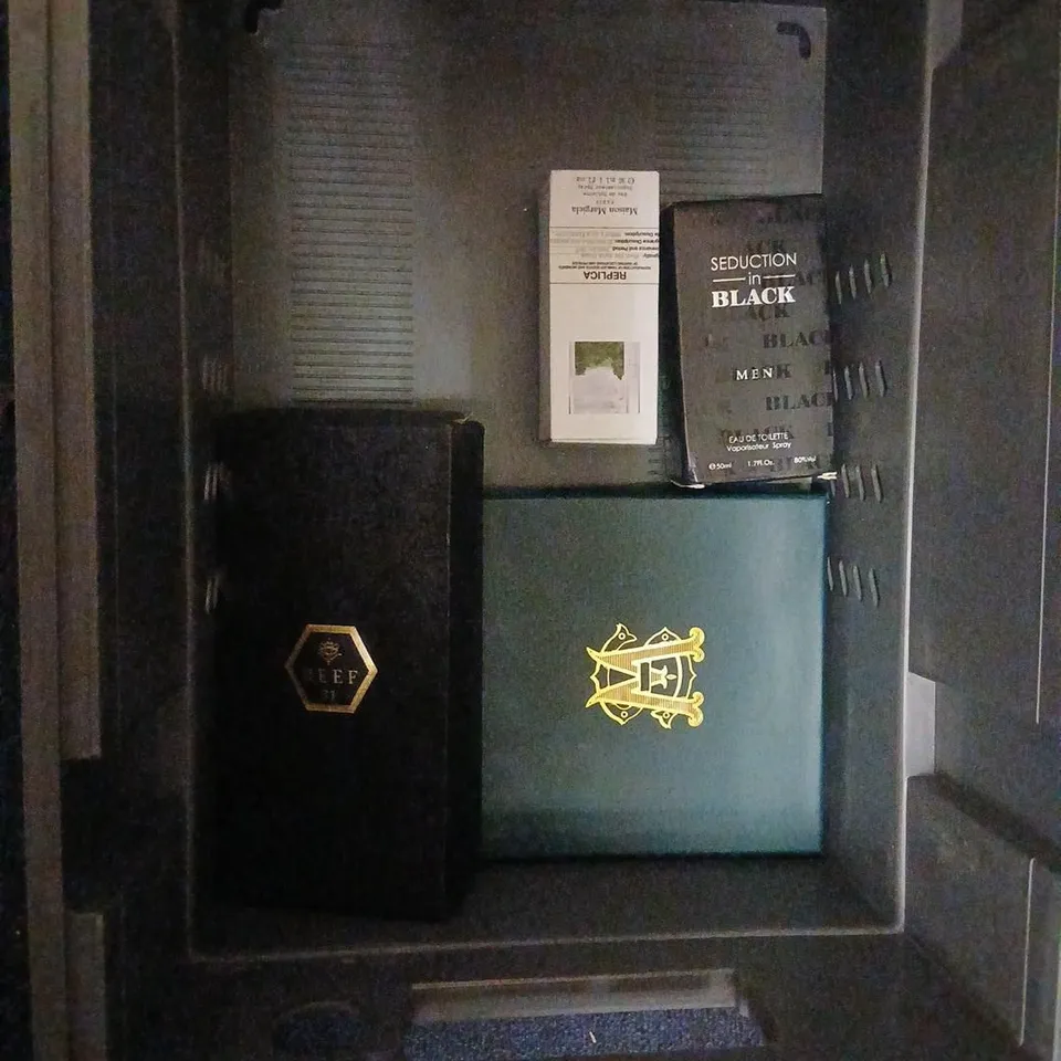 FOUR ASSORTED BOXED FRAGRANCES TO INCLUDE; SEDUCTION IN BLACK AND REEF