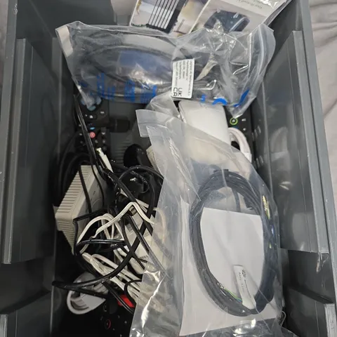 BOX OF ASSORTED CABLES AND PLUGS 