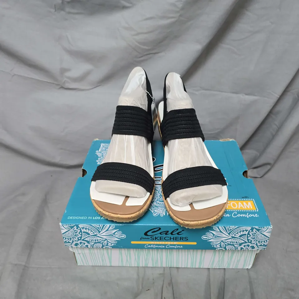 BOXED PAIR OF SKECHERS BEVERLEE SHEER LUCK SANDALS IN BLACK - UK 8