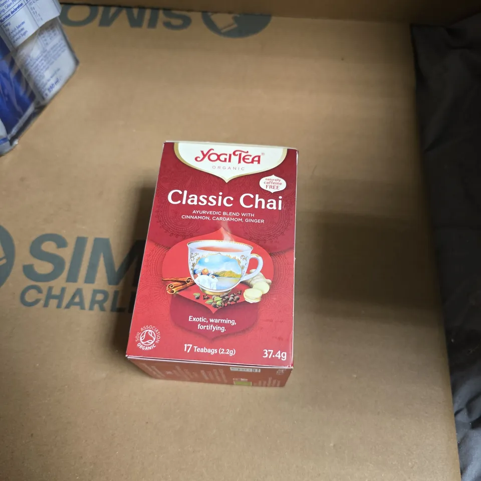APPROXIMATELY 25 ASSORTED FOOD AND DRINK ITEMS INCLUDING RED BULL ENERGY DRINK AND YOGI TEA CLASSIC CHAI 