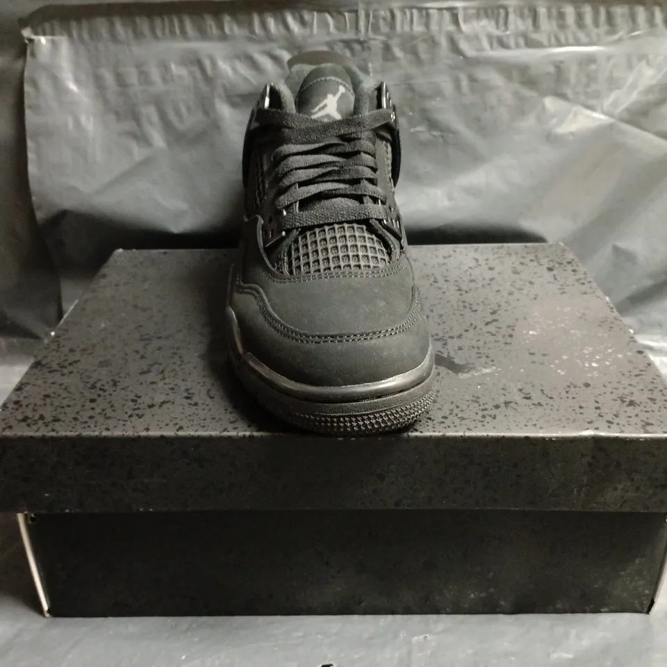 BOXED PAIR OF NIKE AIR JORDAN 4 RETRO SHOES IN BLACK SIZE UK 5