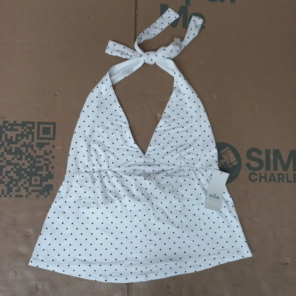 HOLLISTER POLKA DOT HALTER NECK TOP WITH A V-NECKLINE AND TIE DETAIL IN WHITE SIZE SMALL