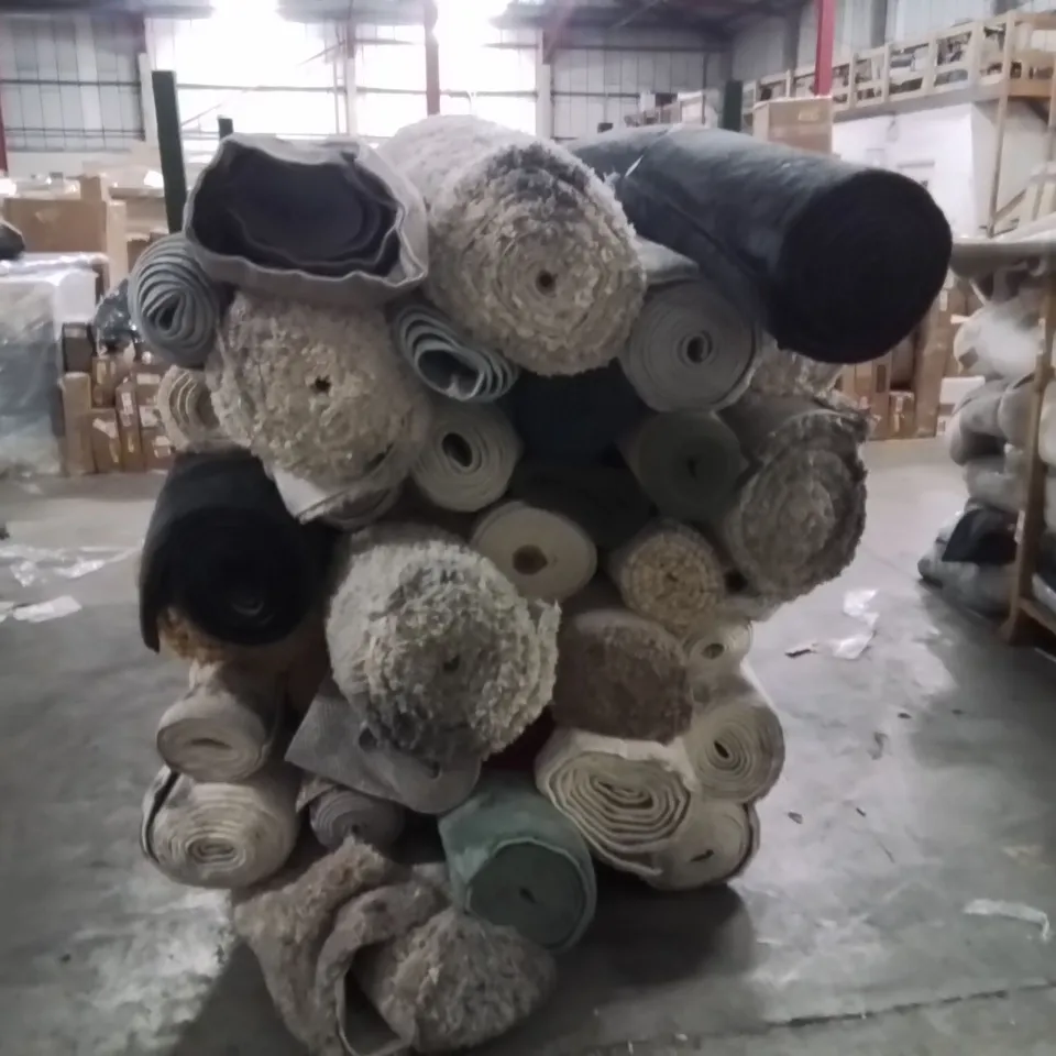 STILLAGE OF APPROXIMATELY 30 QUALITY DESIGNER RUGS