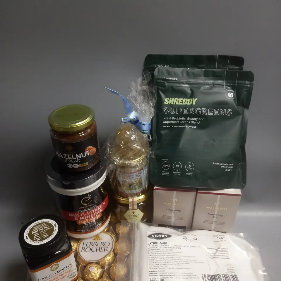 BOX OF APPROX 10 ASSORTED FOOD ITEMS TO INCLUDE - AKSOY CITRIC ACID - MANUKA HONEY - SHREDDY SUPERGREENS SUPPLEMENT ETC