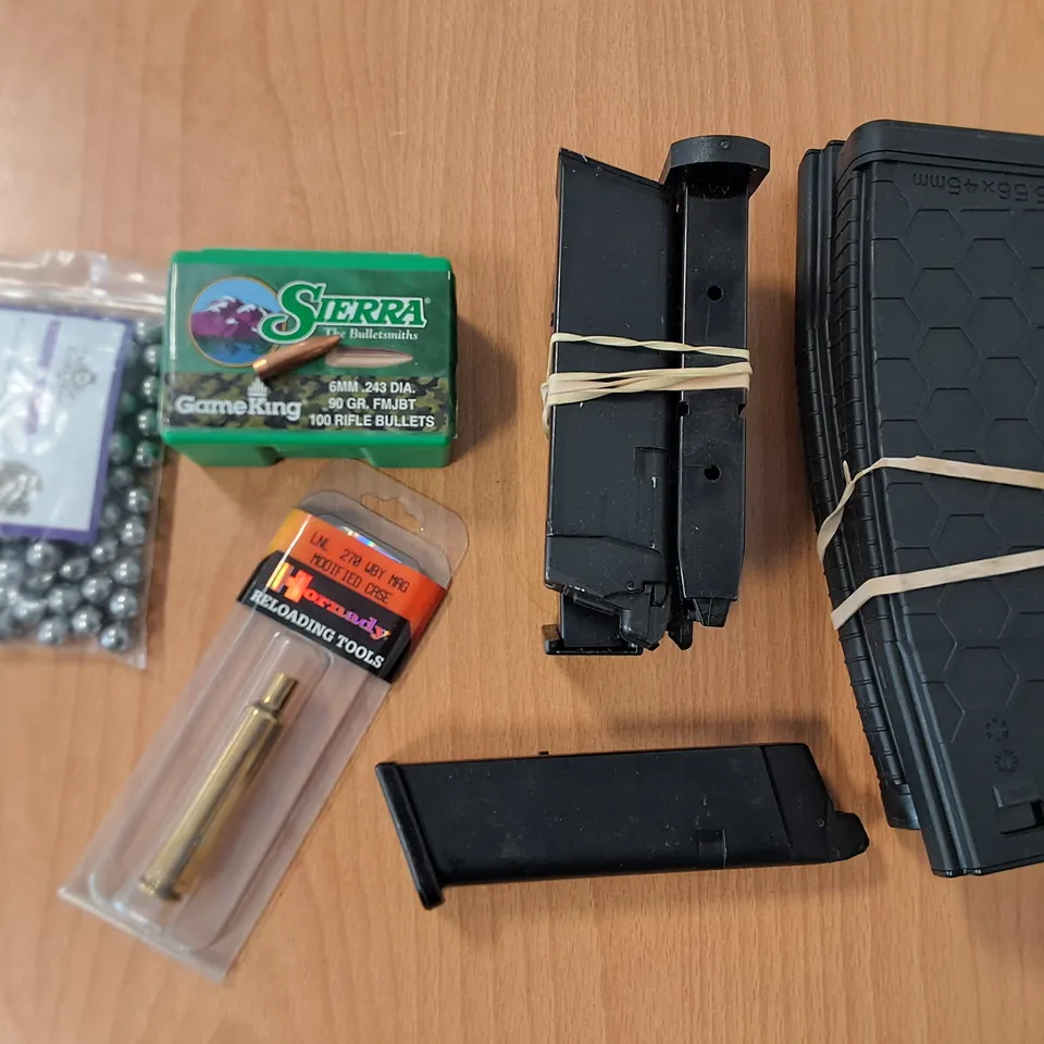 LOT OF AIRSOFT ACCESSORIES TO INCLUDE RIFLE BULLETS, RELOADING TOOL AND MAGAZINES