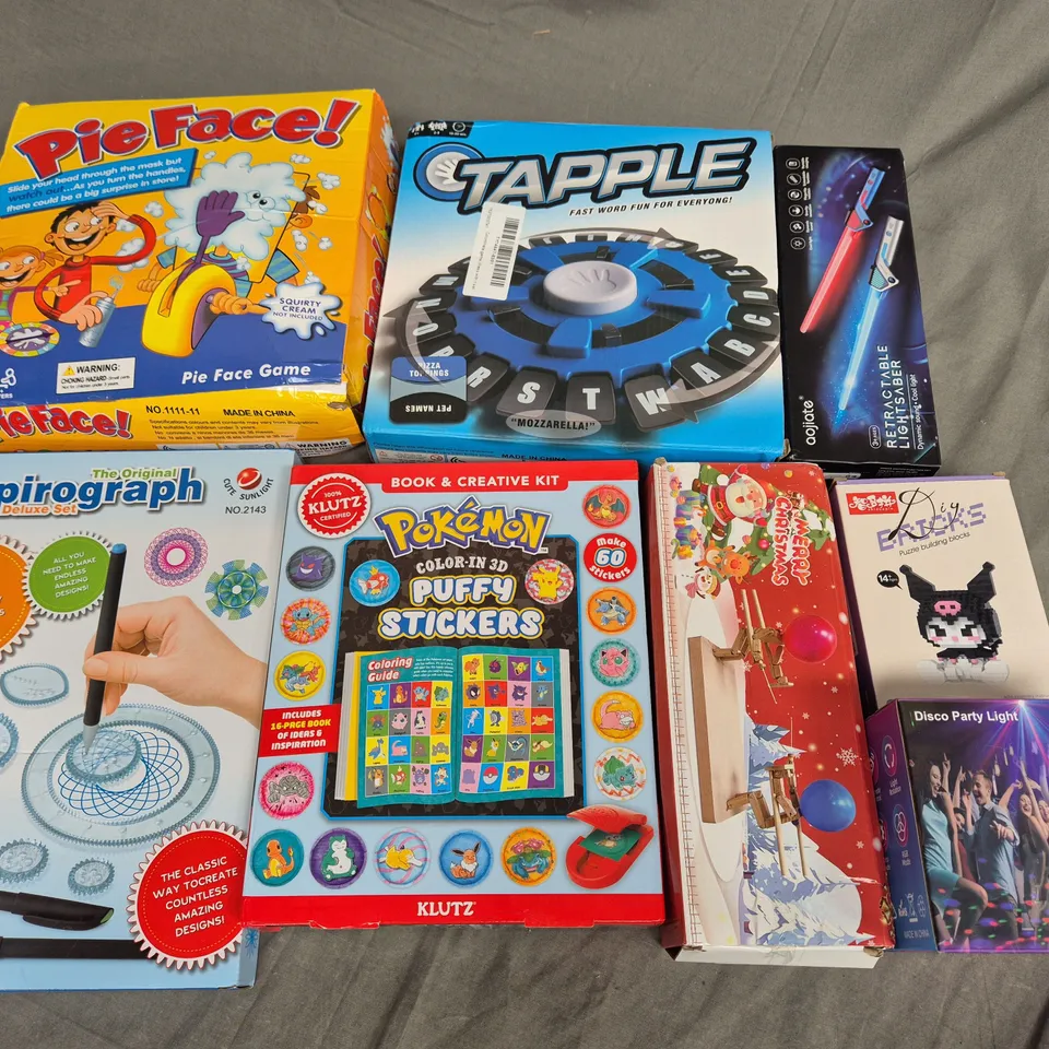 LOT OF 8 ASSORTED TOYS AND GAMES TO INCLUDE POKEMON PUFFY STICKERS, SPIROGRAPH AND TAPPLE GAME