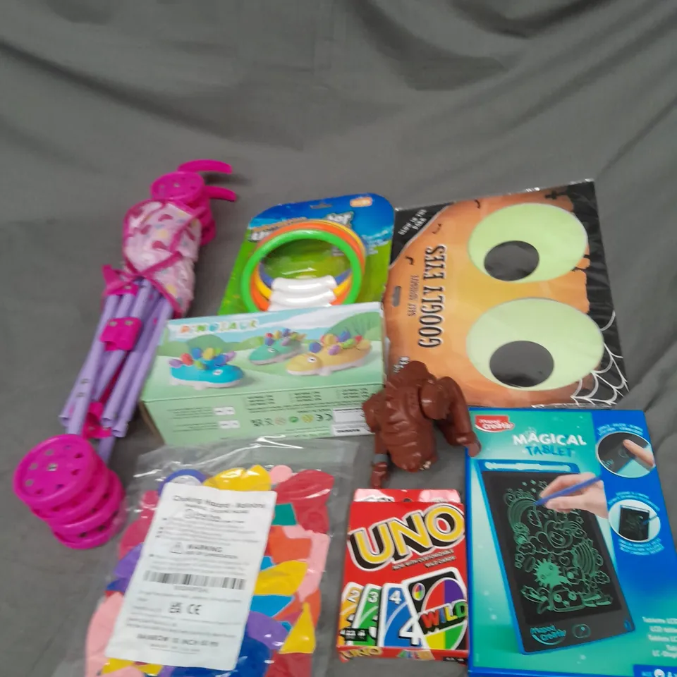 BOX OF ASSORTED TOYS AND GAMES TO INCLUDE UNO, BABYS PRAM AND BALLOON
