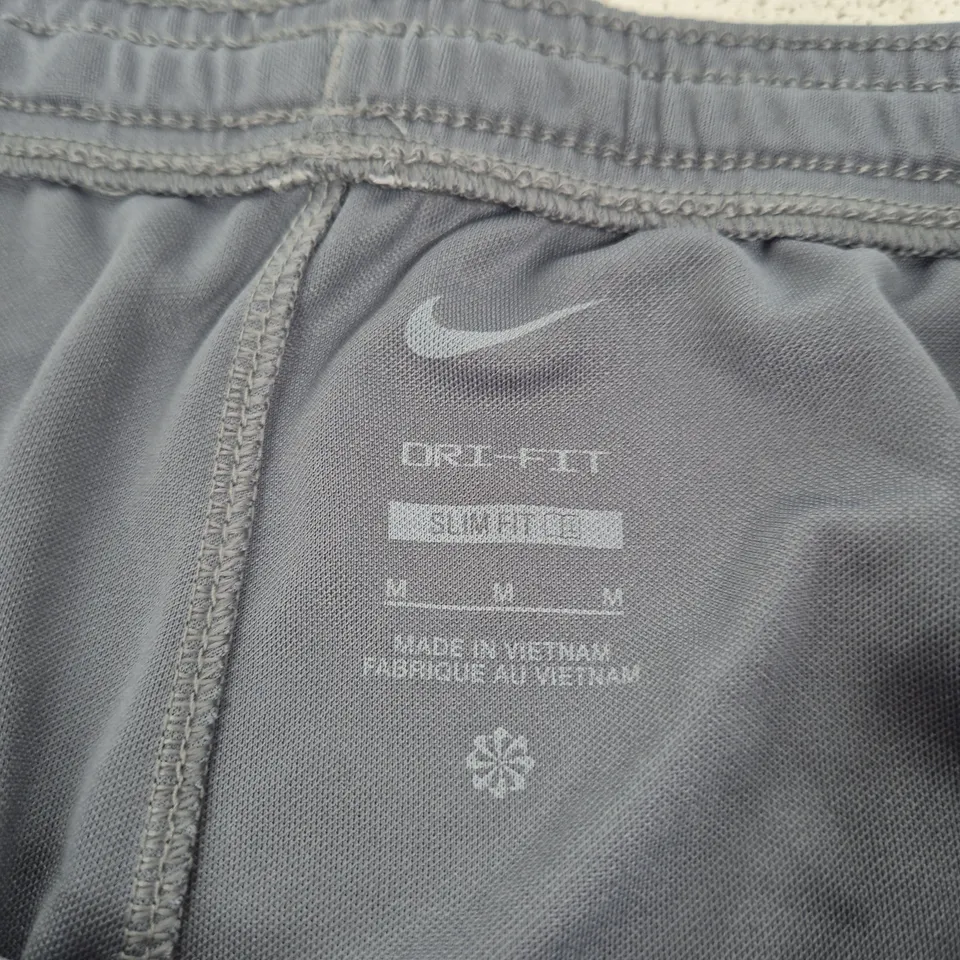 NIKE DRI-FIT SHORTS – GREY WITH PINK SWOOSH - SIZE M