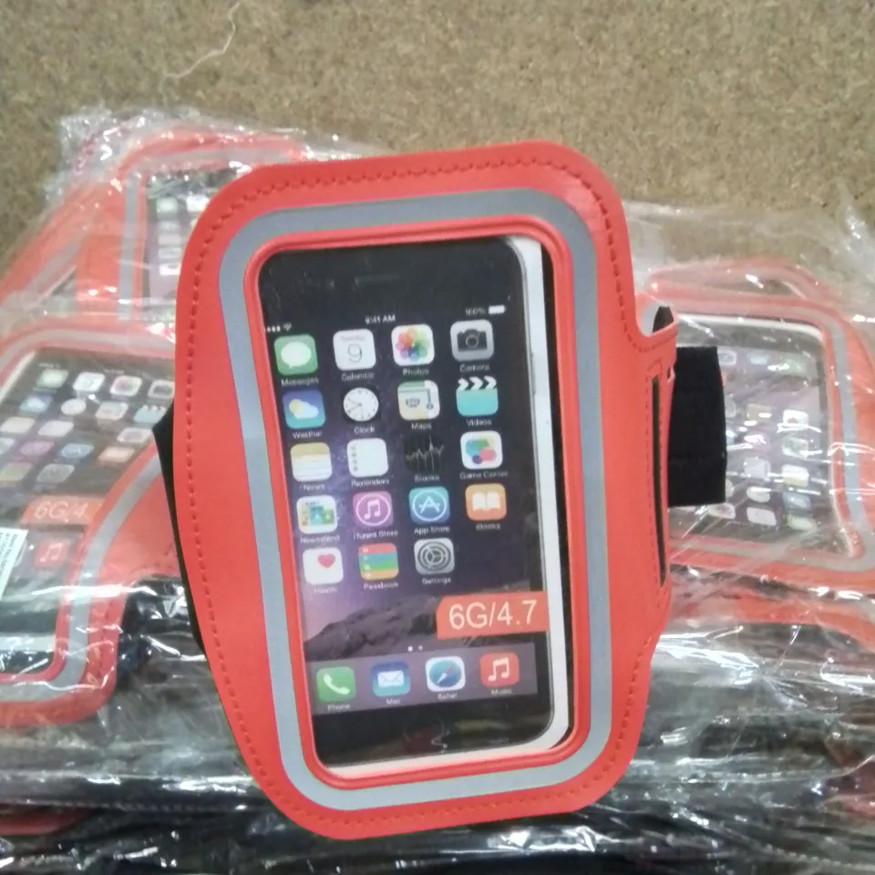 MIXED LOT CONTAINING VARIOUS ITEMS TO INCLUDE, SEVERAL GHANA FLAGS, LARGE AMOUNT OF ARM BAND PHONE HOLDERS ETC.