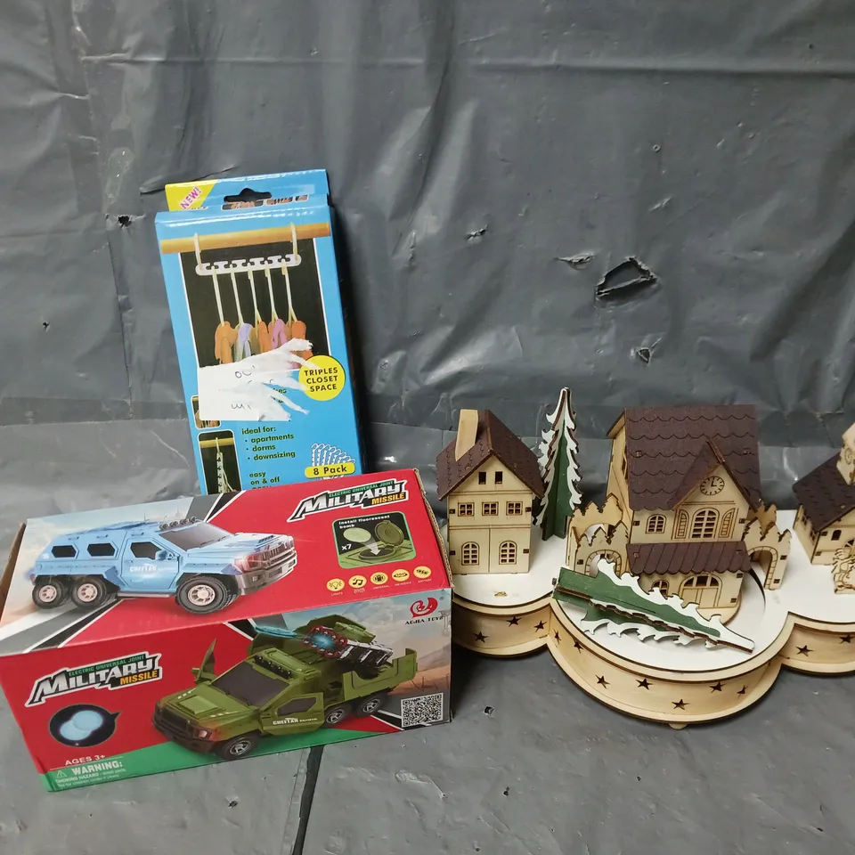 APPROXIMATELY 20 ASSORTED ITEMS TO INCLUDE WOODEN ORNAMENT PIECE, HANGARS, TOY TRUCK, ETC