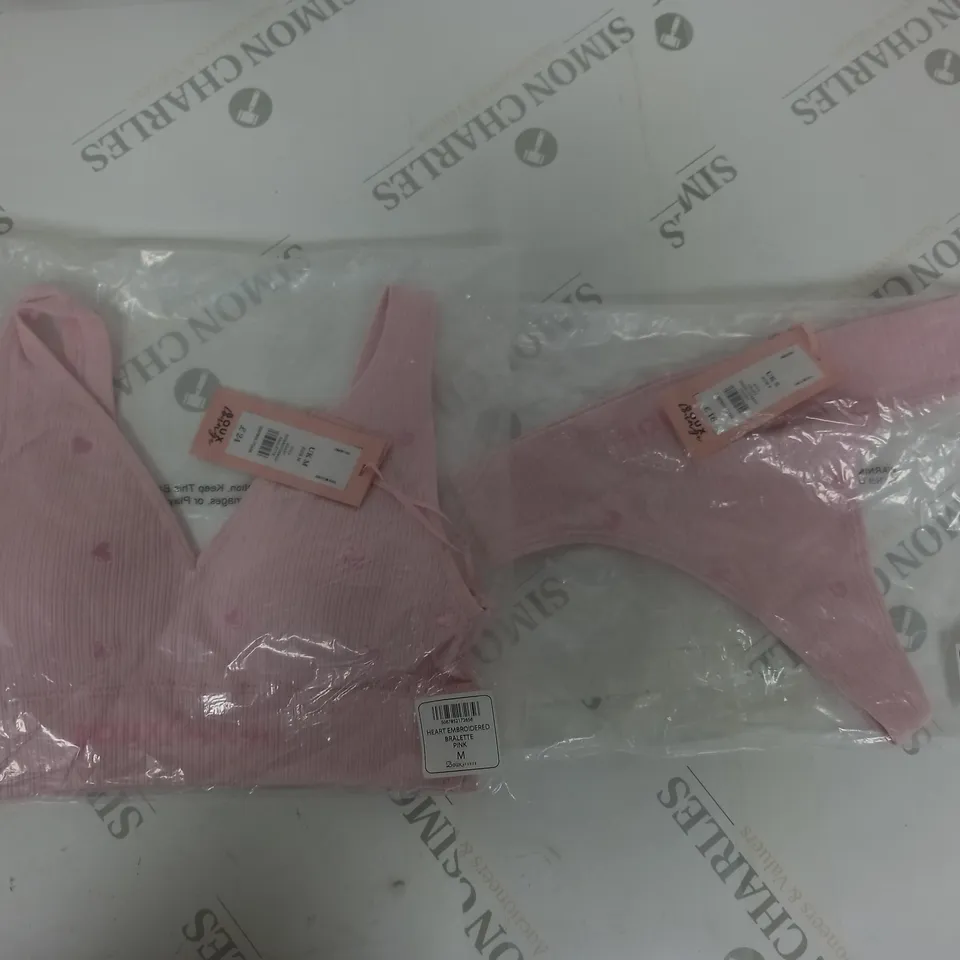 2 SEALED BOUX LOUNGE ITEMS TO INCLUDE PINK HEART EMBROIDERED BRALETTE IN MEDIUM AND PINK HEART EMBROIDERED THONG IN SMALL 