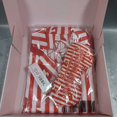 BOX OF 3 ASSORTED PLOUISE PRODUCTS TO INCLUDE - CANDY CANE PYJAMAS IN RED SIZE 9-10YRS - CANDY CANE SWEET DREAMS SLEEP MASK - STAY SHINING HYDRATING LIP FORMULA IN RASPBERRY REIGN