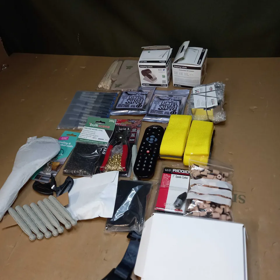 LOT OF ASSORTED ITEMS TO INCLUDE REMOTE CONTROLS, SHOWER HEADS AND ASSORTED PENS