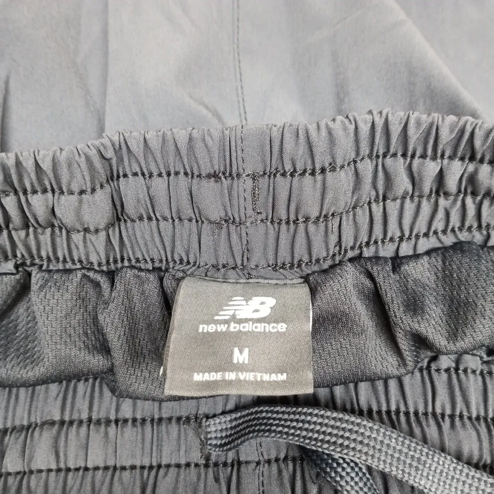 NEW BALANCE MEDIUM GREY TRACK SUIT BOTTOMS
