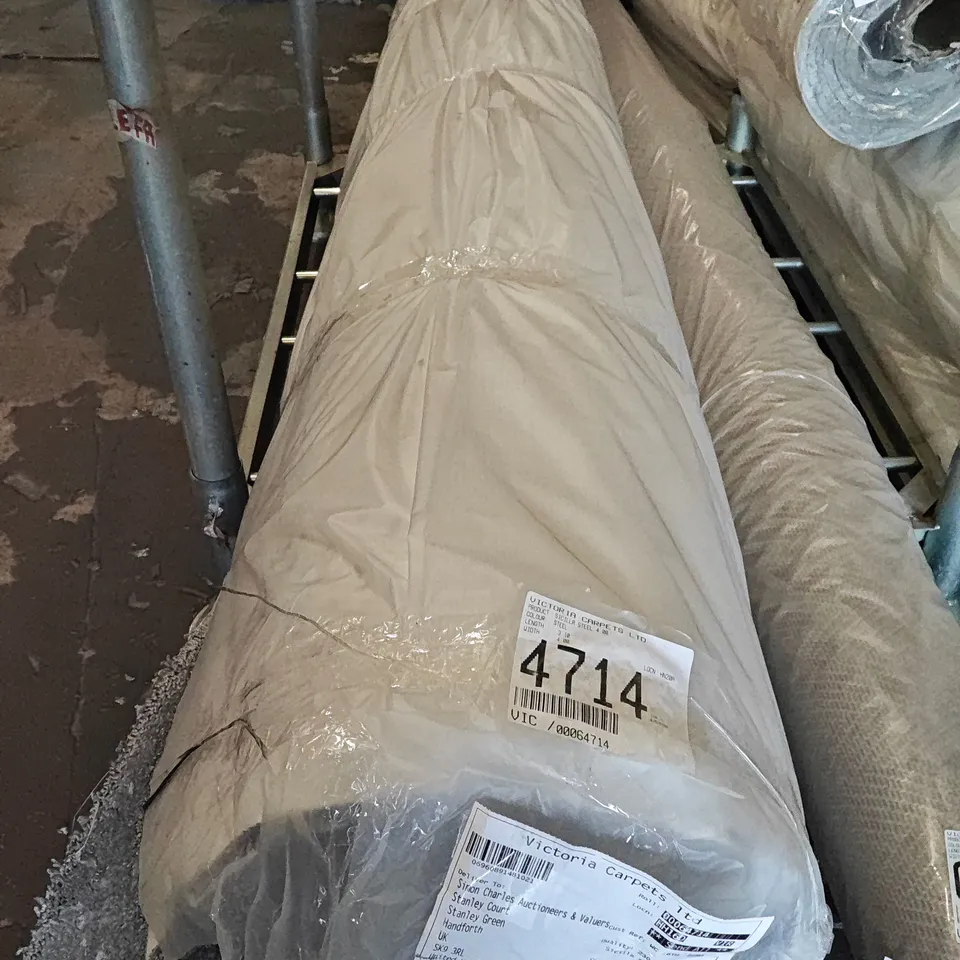 Quality bagged and rolled sicilla carpet in steel - approximately length 3.10m width 4m