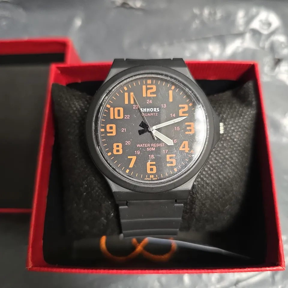 SHHORS BLACK PLASTIC QUARTZ WRISTWATCH WITH ORANGE NUMERALS – BOXED 