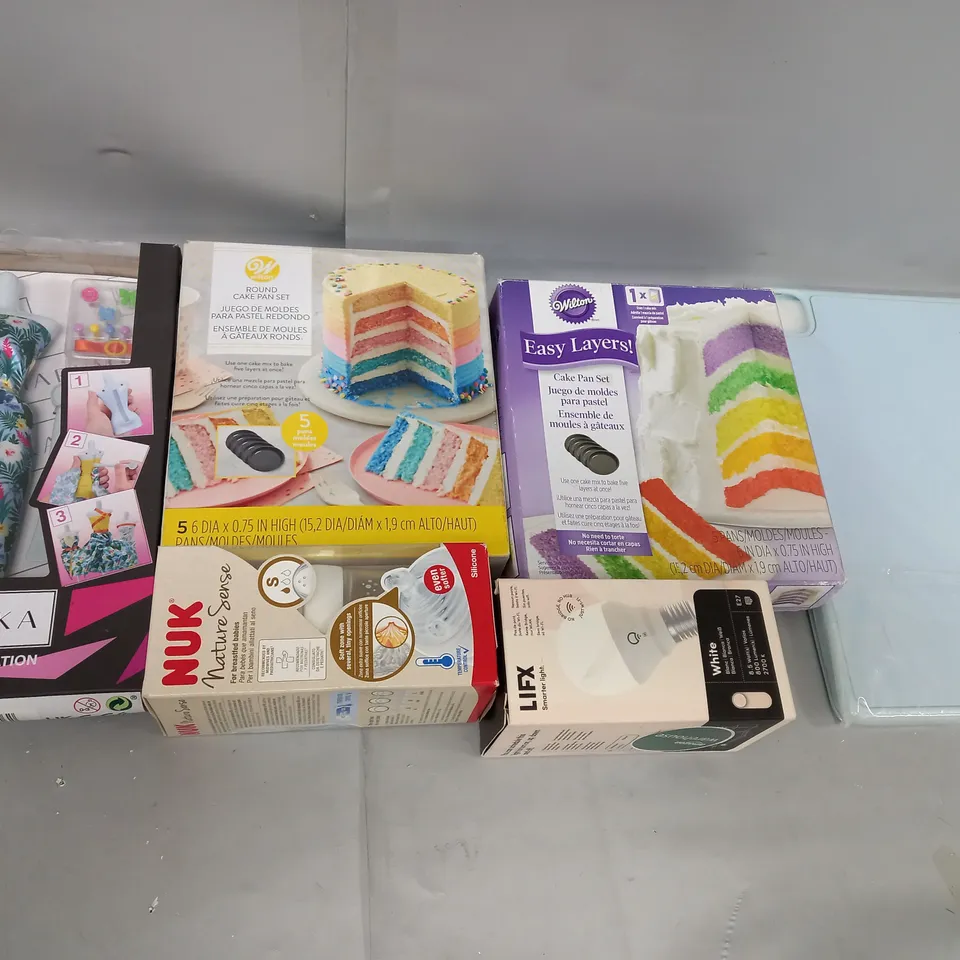 LARGE BOX OF 50 ASSORTED ITEMS TOO INCLUDE CAKE KITS , BABY BOTTLES AND I PAD CASES , ETC 