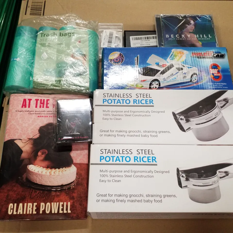 PALLET OF ASSORTED PRODUCTS INCLUDING POTATO RICER, AT THE TABLE BOOK, TOY POLICE CAR, TRASH BAGS, CHAIN BELTS, BECKY HILL CDS