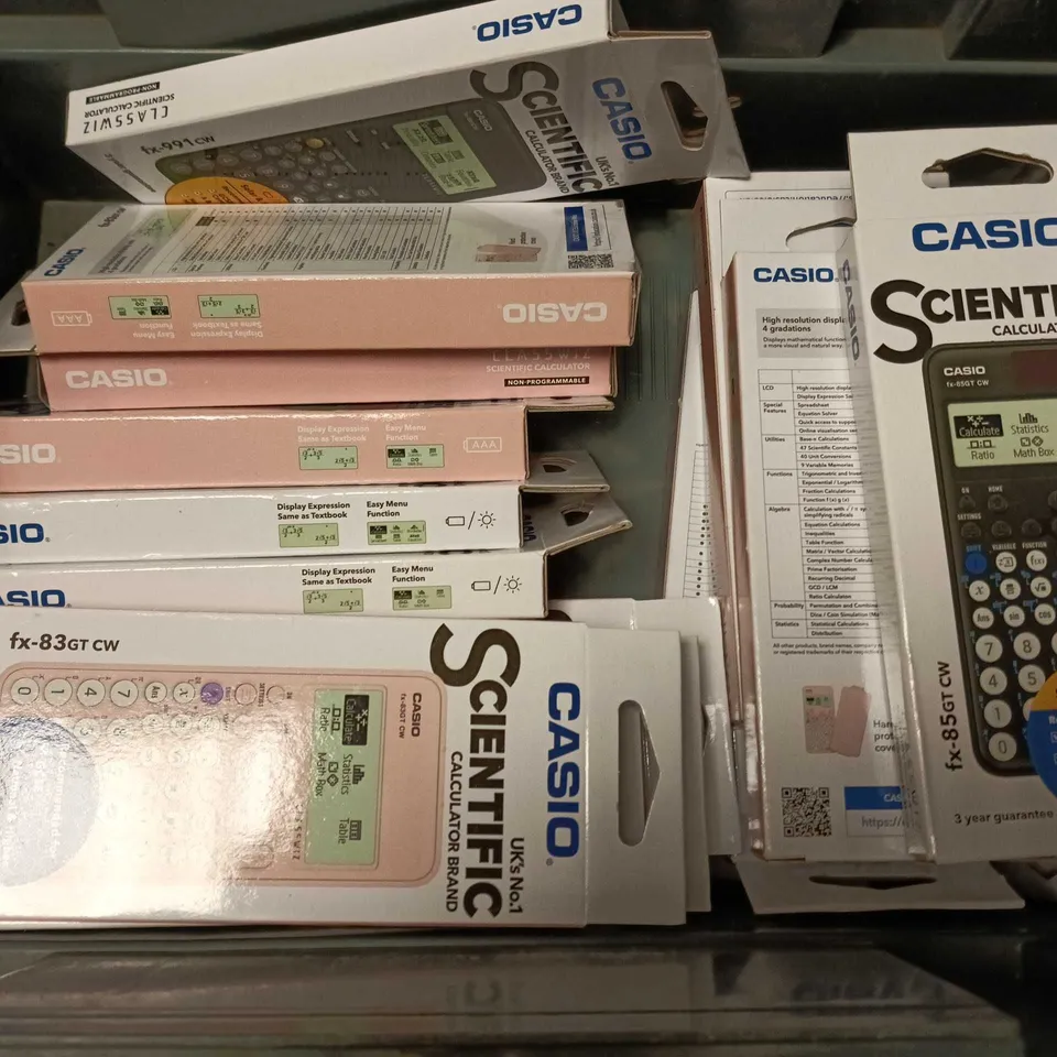APPROXIMATELY 15 ASSORTED CASIO SCIENTIFIC CALCULATORS IN PINK & BLACK 