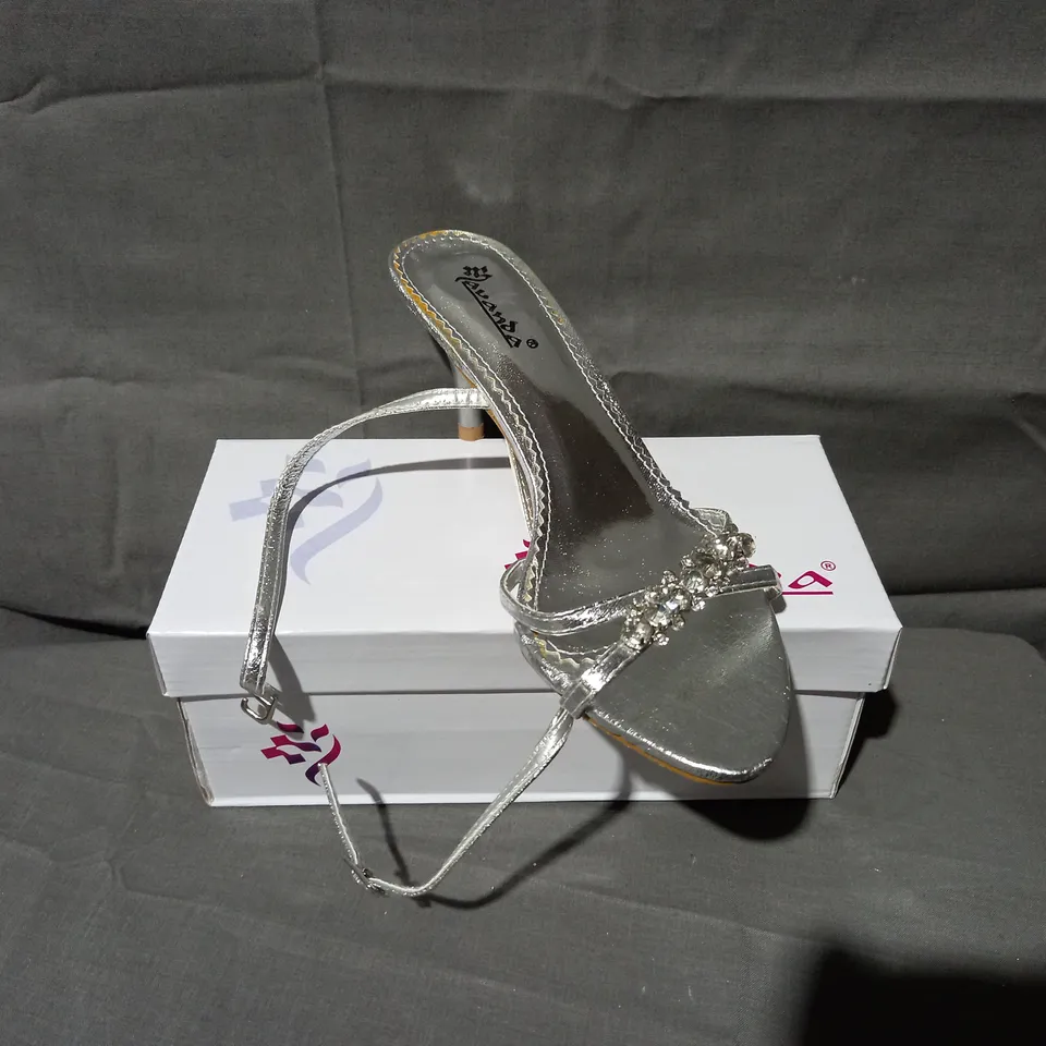 APPROXIMATELY 24 BOXED PAIRS OF LAVANDA STRAP SANDALS IN SILVER VARIOUS SIZES TO INCLUDE SIZES 37, 38, 39