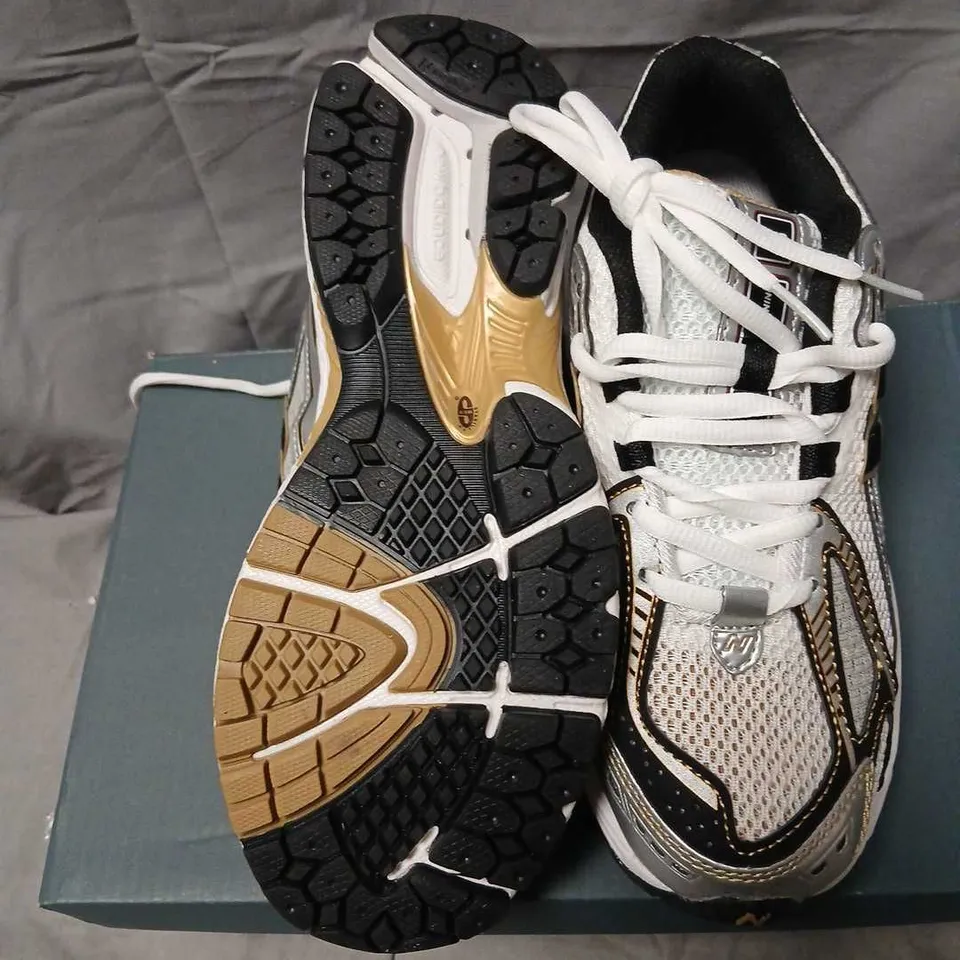 NEW BALANCE W1906RA LIFESTYLE WOMEN'S SNEAKERS – WHITE/BLACK/GOLD