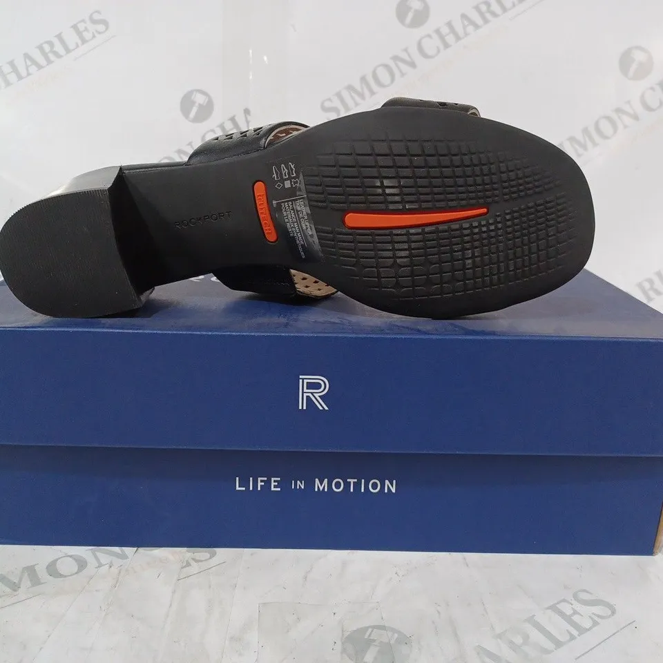 BOXED PAIR OF ROCKPORT TOTAL MOTION ALAINA MULE HEELED SANDALS IN BLACK UK SIZE 5