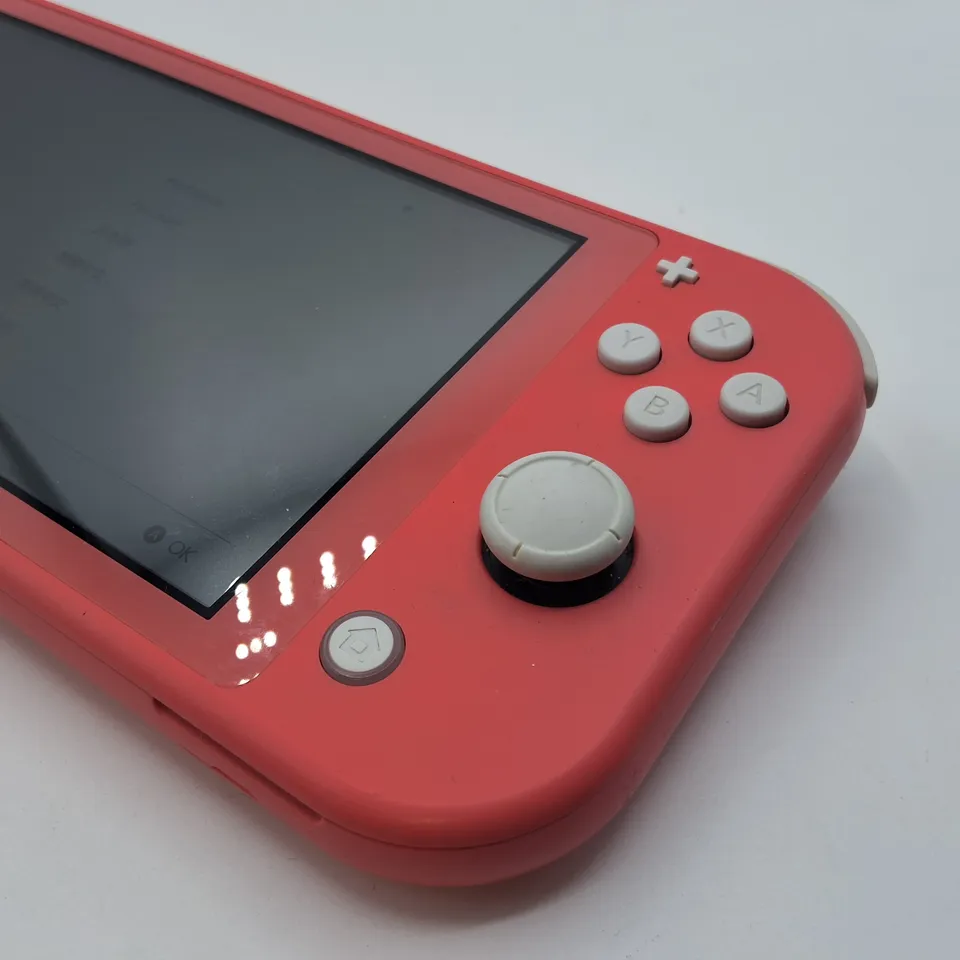 UNBOXED NINTENDO SWITCH LITE IN BLUSH WITH UNIFORM NUMSKULL CASE -HDH-001