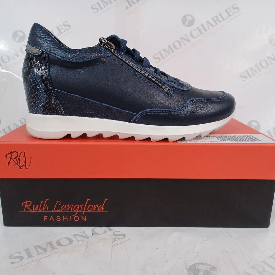 BOXED PAIR OF RUTH LANGSFORD WEDGE TRAINERS IN NAVY SIZE 4