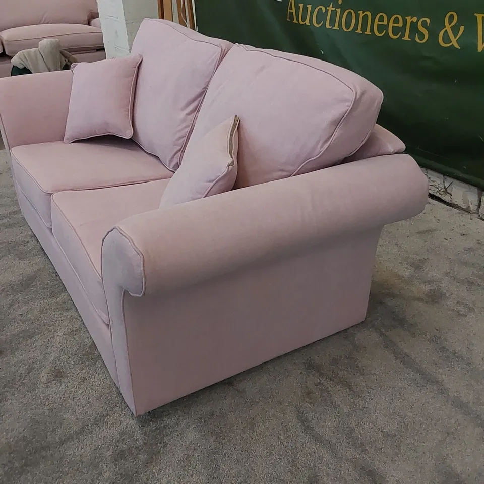 THE LANGRIDGE 2 SEATER SOFA BED IN UPHOLSTERED PINK FABRIC