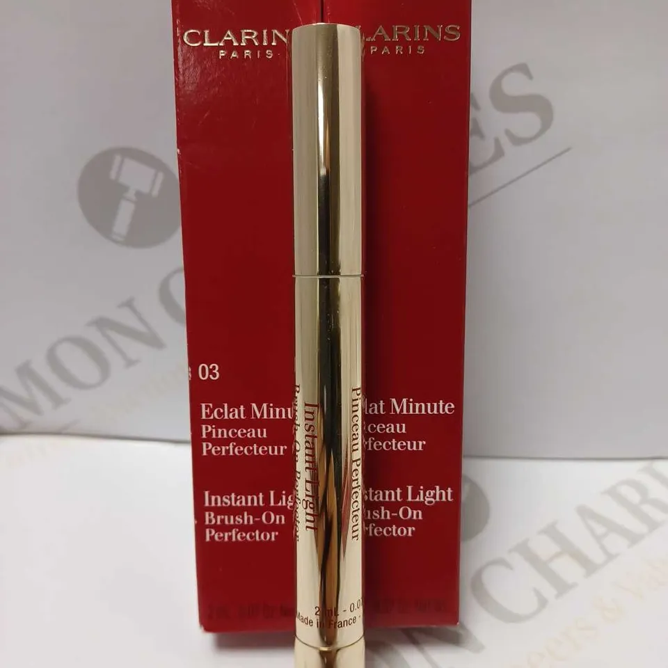 LOT OF 2 CLARINS INSTANT LIGHT BRUSH-ON PERFECTOR - #03