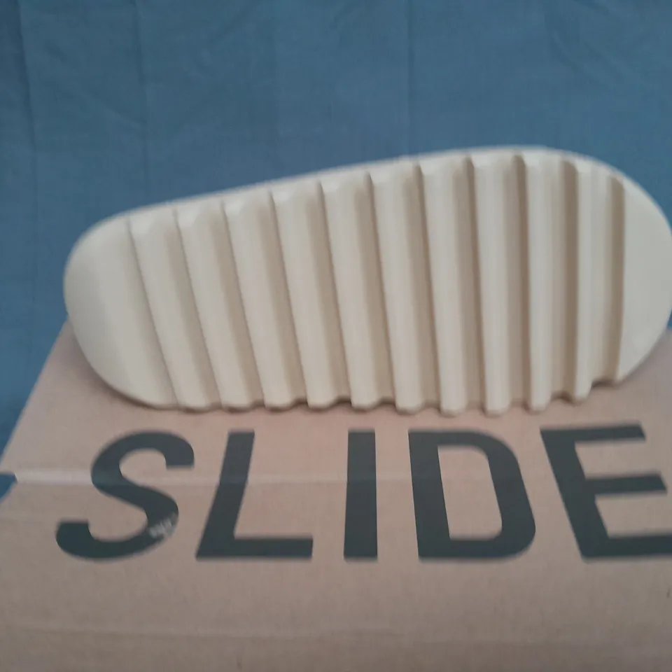 BOXED PAIR OF YEEZY SLIDE BY ADIDAS UK 9 
