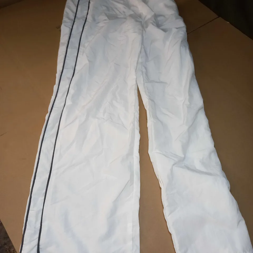 PULL & BEAR BAGGY TRACKSUIT PANTS IN WHITE WITH BLACK STRIPE - SMALL