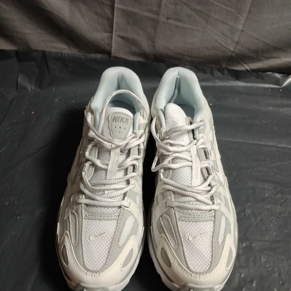 PAIR OF NIKE P6000 TRAINERS - UK SIZE 7