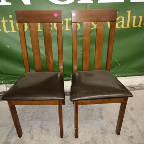 PAIR OF WOODEN DINING CHAIRS WITH BLACK FAUX LEATHER SEAT PADS
