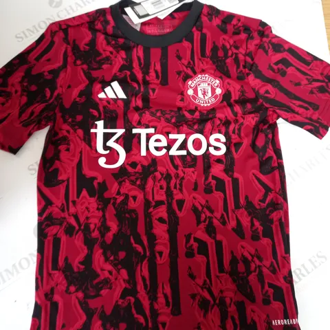 MANCHESTER UNITED FC TRAINING SHIRT SIZE 11-12 YEARS