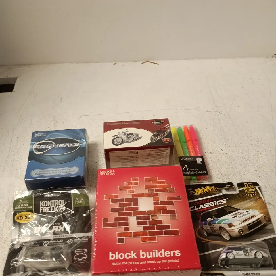 APPROXIMATELY 10 ASSORTED TOYS INCLUDING KONTROL FREEK PERFORMANCE THUMBSTICKS, MARKS & SPENCER BLOCK BUILDERS AND MARKS & SPENCER EGGHEADS