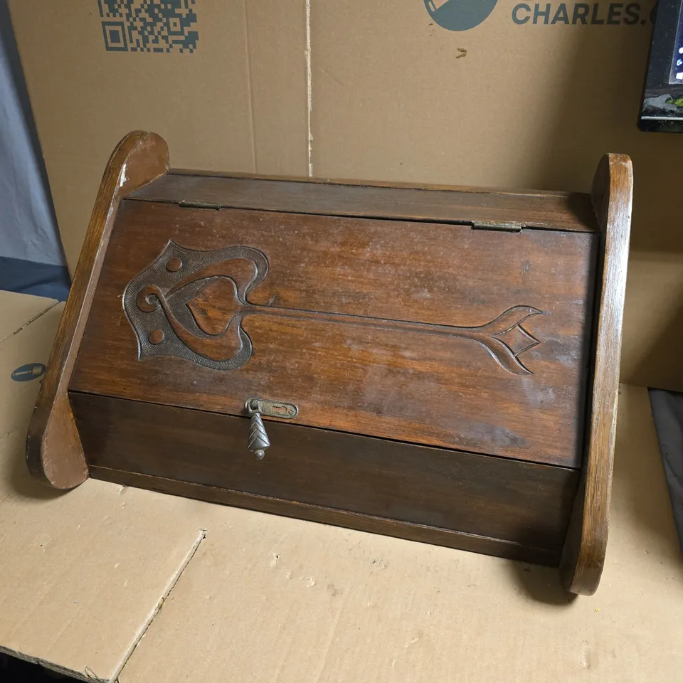 VINTAGE WOODEN STORAGE BOX WITH CARVED KEY MOTIF AND BRASS LATCH