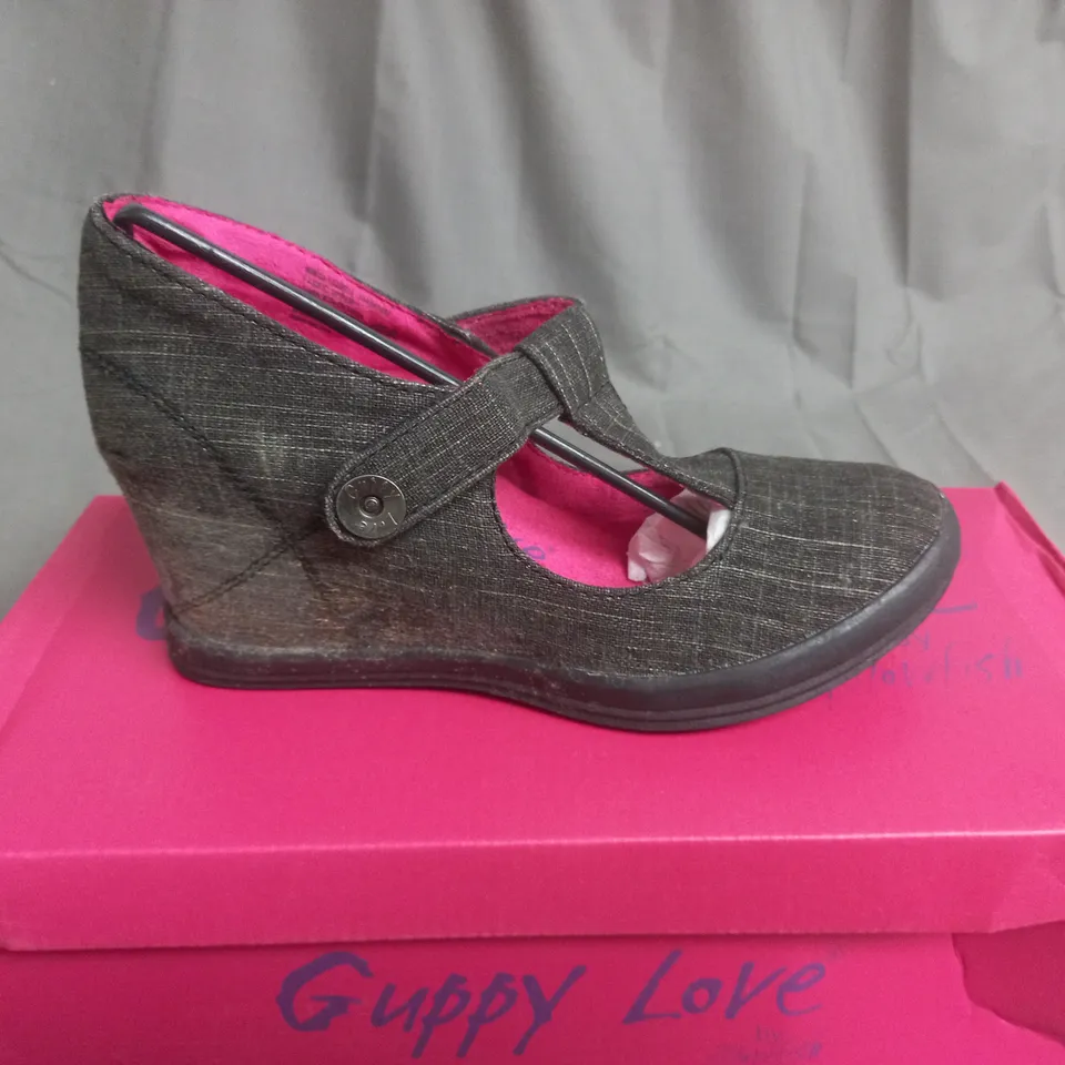 BOX OF APPROXIMATELY 7 BLACK  GUPPY LOVE BY BLOWFISH SHOES IN VARIOUS SIZES 