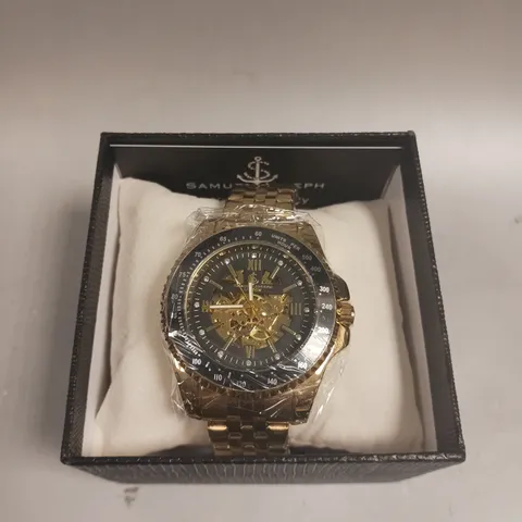 BOXED SAMUEL JOSEPH SKELETON MECHANISM GOLD WATCH