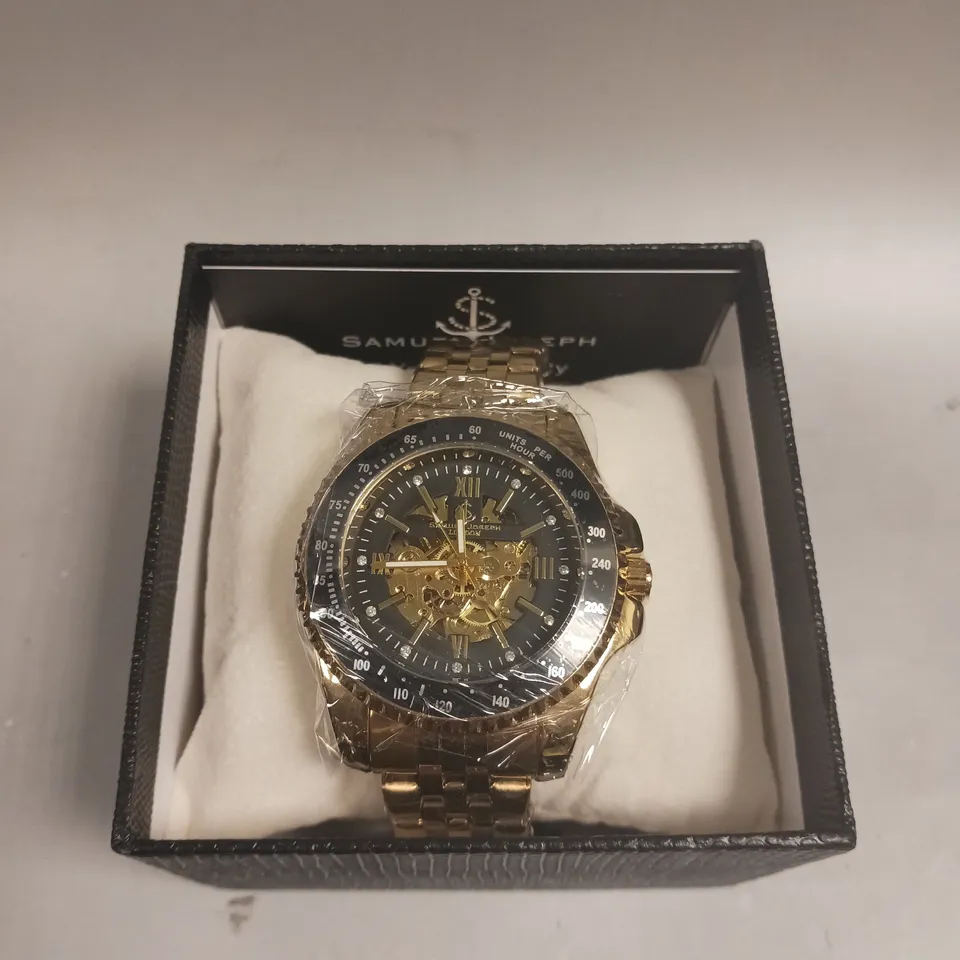 BOXED SAMUEL JOSEPH SKELETON MECHANISM GOLD WATCH 